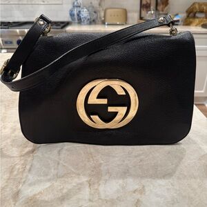 Gucci Black Leather Shoulder Bag with Gold Emblem